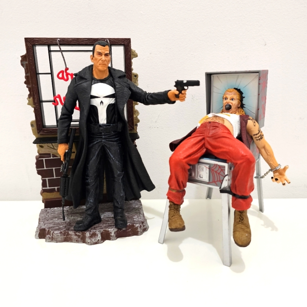 Marvel's Punisher and Pinball victim action figures by Diamond Select Toys.